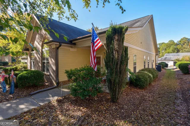 an aerial view of houses with outdoor space
