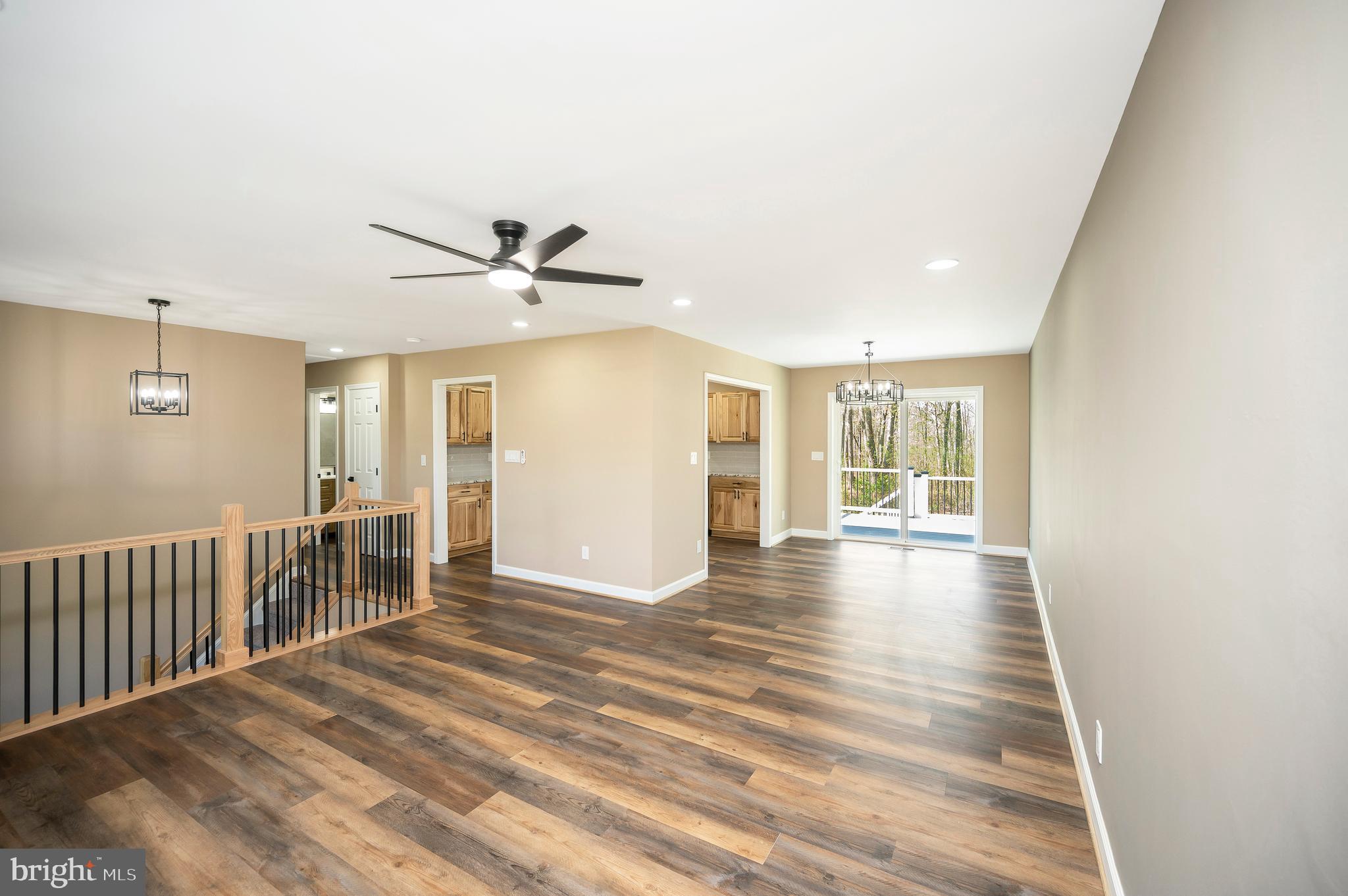 13452 Post Oak Road Spotsylvania, VA 22551 - Photo 19 of 56 a view of a livingroom with a ceiling fan and window