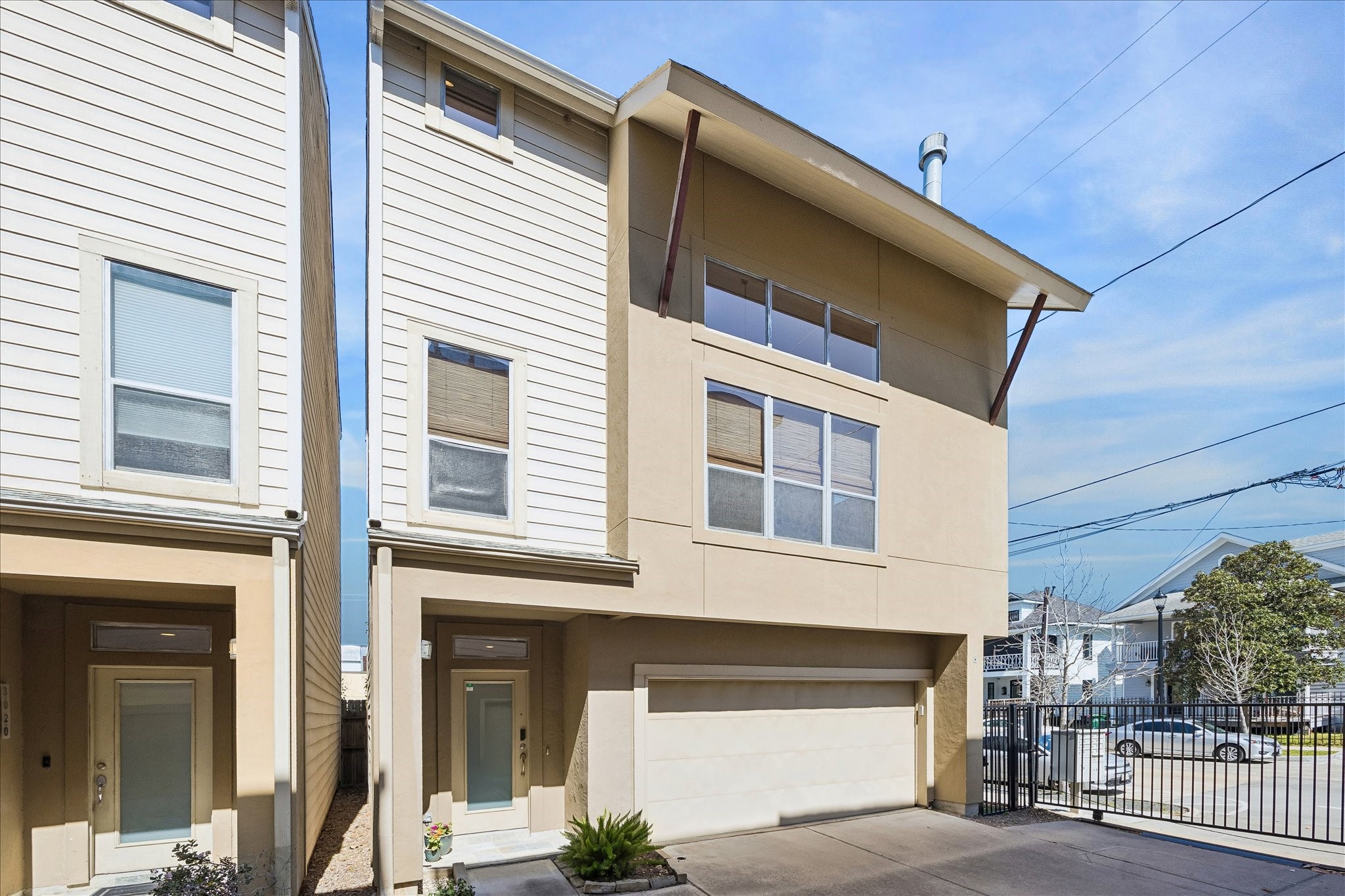 a front view of a house with a garage