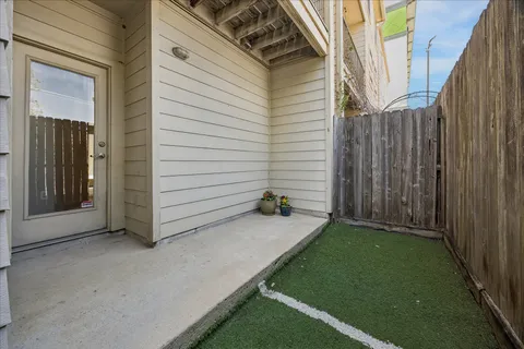 a view of backyard with cabin