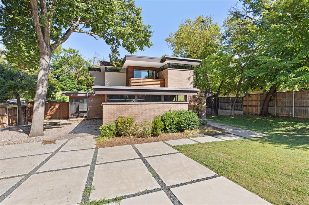 4041 Capps Drive Dallas, TX 75209 - Photo 1 of 1 a front view of a house with garden