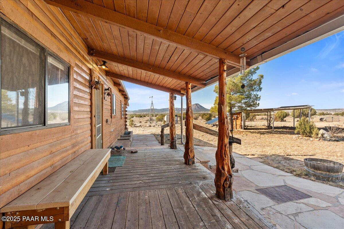 9797 Rocky Rabbit Road Ash Fork, AZ 86320 - Photo 22 of 36 a view of a balcony with car parked
