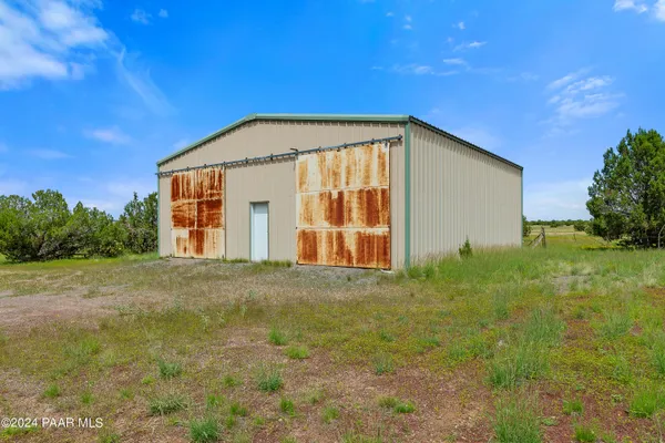 a view of an empty room with racks