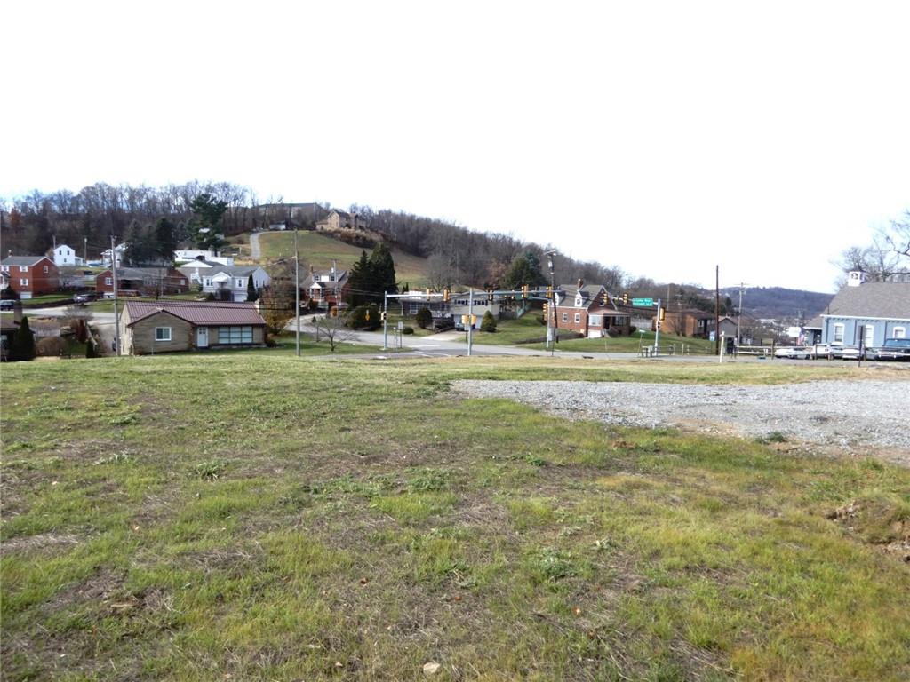 205 McClelland Road Canonsburg, PA 15317 - Photo 4 of 12 a view of a big yard with cars parked