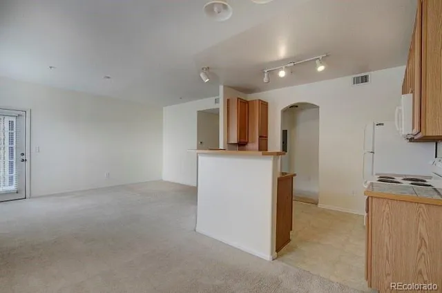 a view of a kitchen with a sink