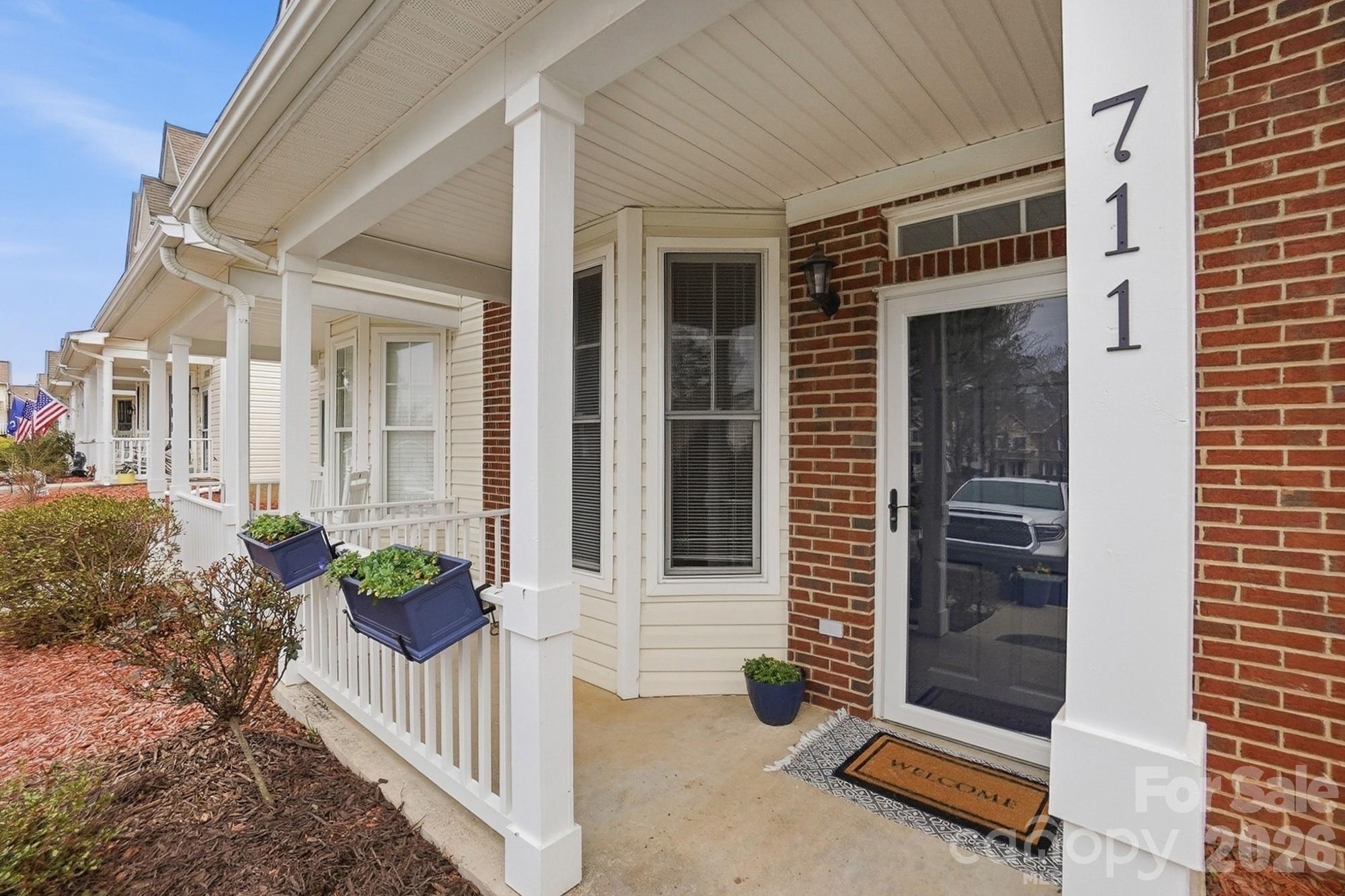 711 Stone Village Drive Fort Mill, SC 29708 - Photo 6 of 46 a front view of a house with a porch
