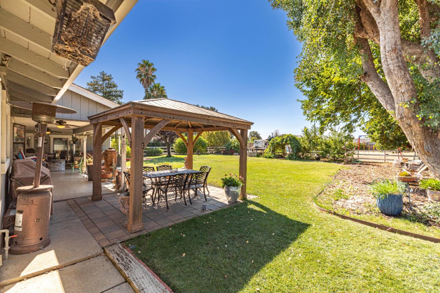 150 Jonquil Lane Hollister, CA 95023 - Photo 12 of 61 a view of outdoor space yard deck patio and outdoor kitchen