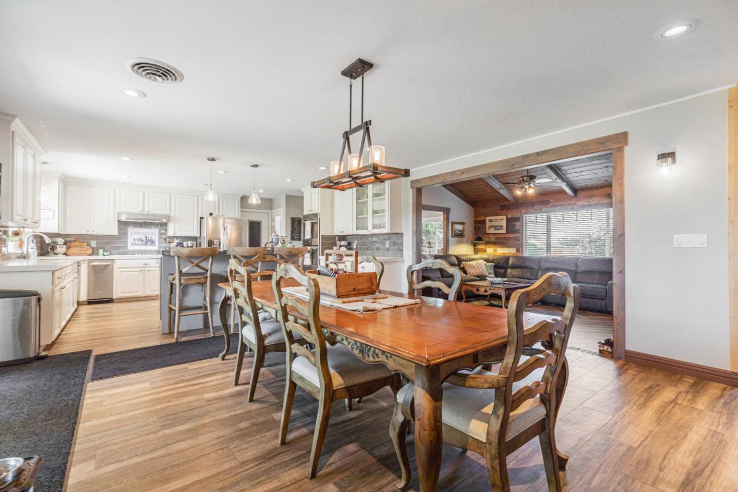 150 Jonquil Lane Hollister, CA 95023 - Photo 19 of 61 a dining room with furniture window and wooden floor