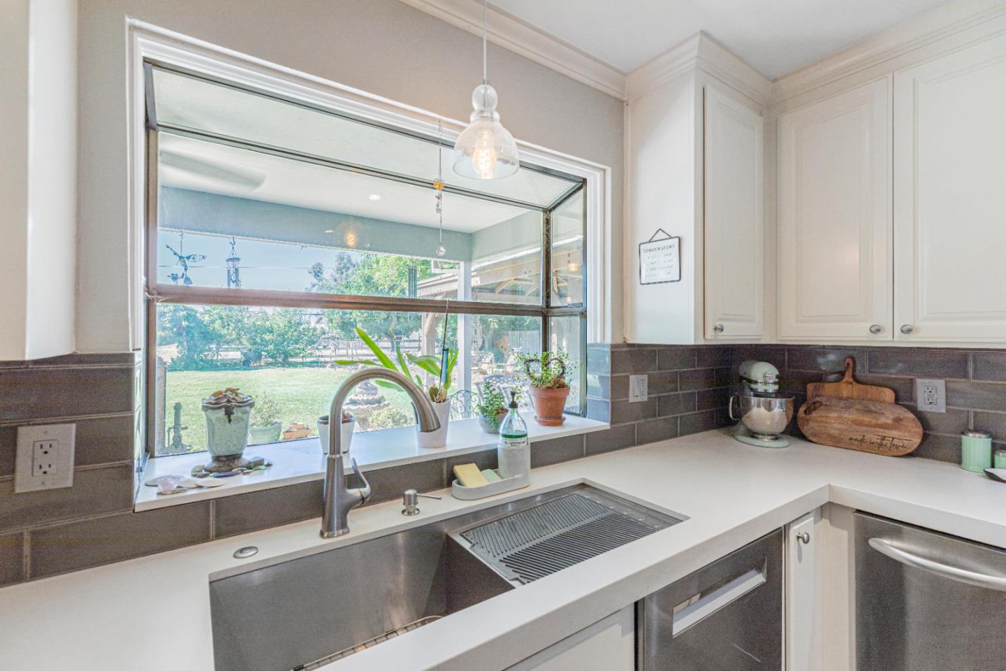 150 Jonquil Lane Hollister, CA 95023 - Photo 24 of 61 a kitchen with a sink and a window