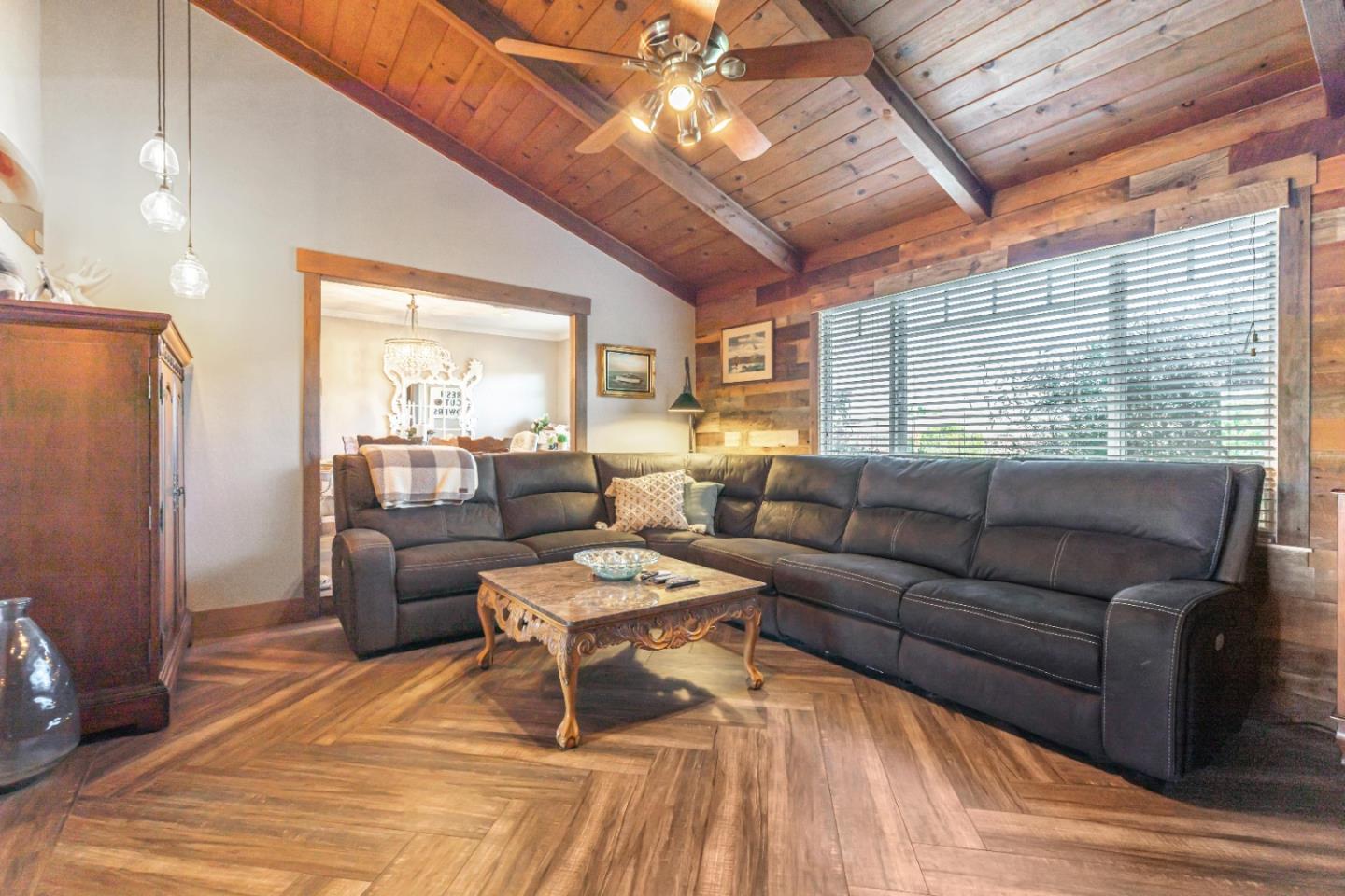 150 Jonquil Lane Hollister, CA 95023 - Photo 30 of 61 a living room with furniture and a large window