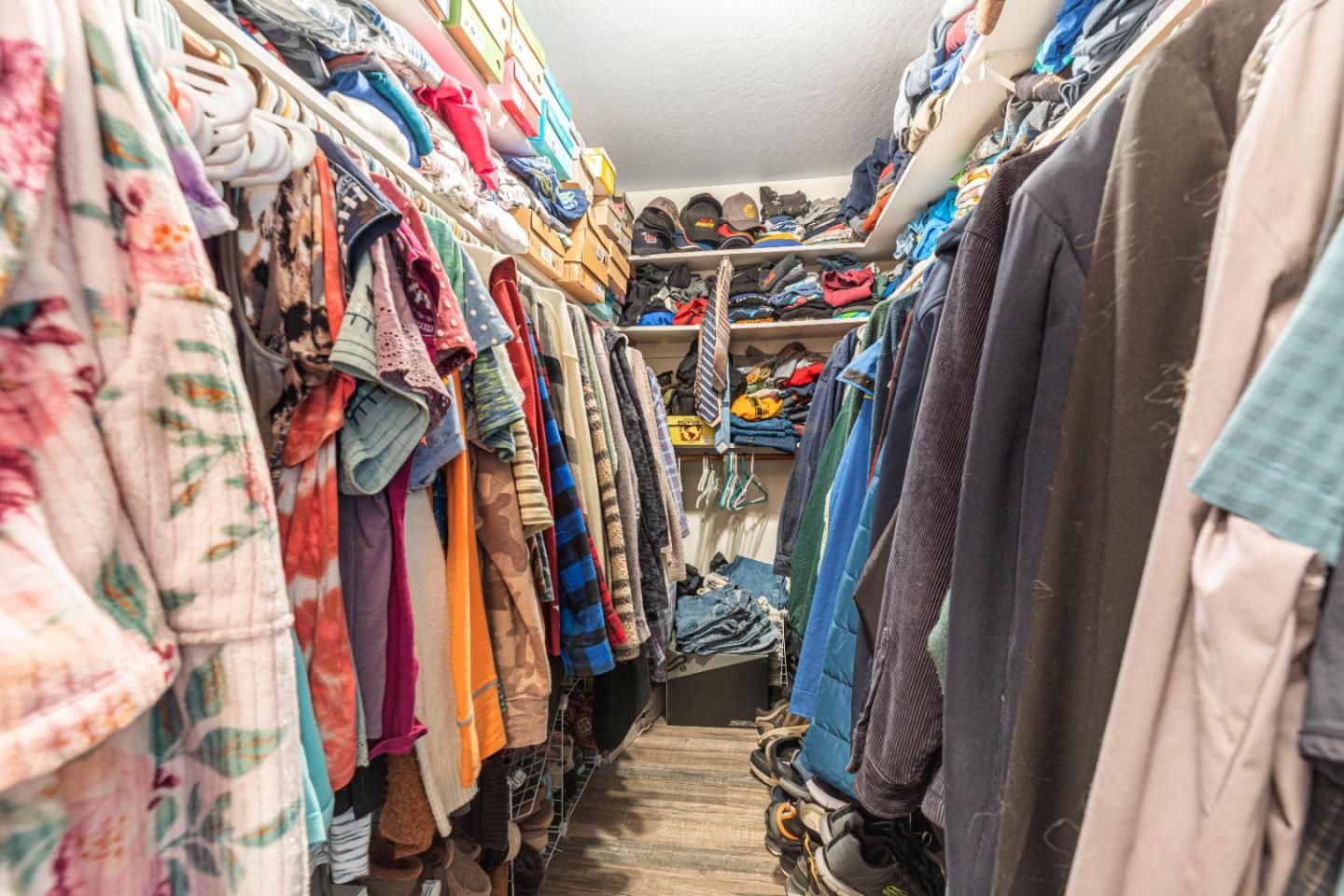 150 Jonquil Lane Hollister, CA 95023 - Photo 38 of 61 a view of walk in closet with clothes