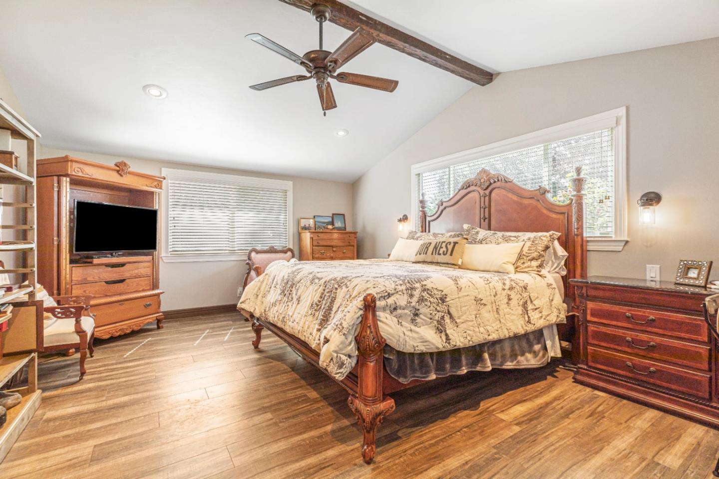 150 Jonquil Lane Hollister, CA 95023 - Photo 41 of 61 a bedroom with a bed and a flat screen tv