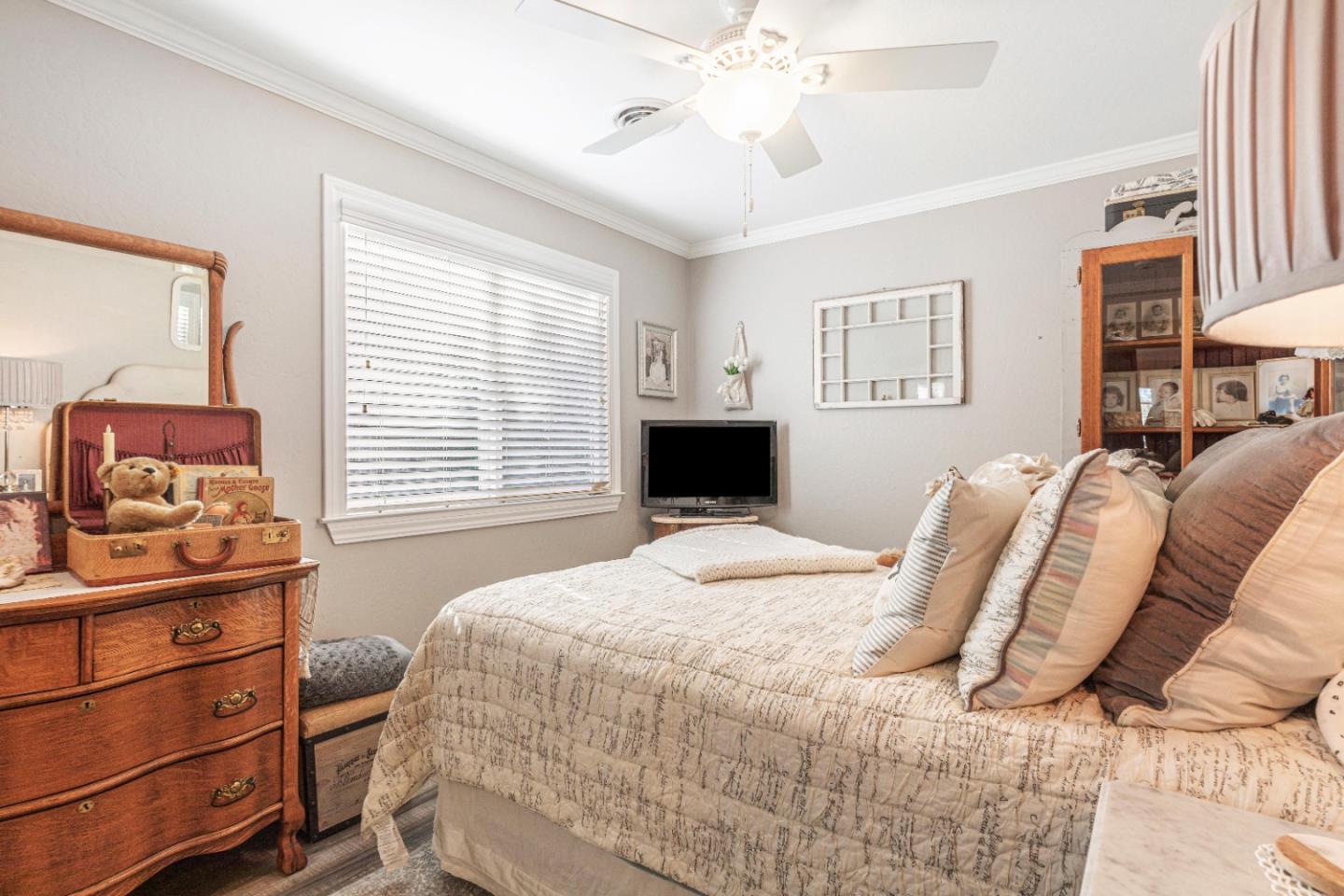 150 Jonquil Lane Hollister, CA 95023 - Photo 44 of 61 a bedroom with a bed and a window