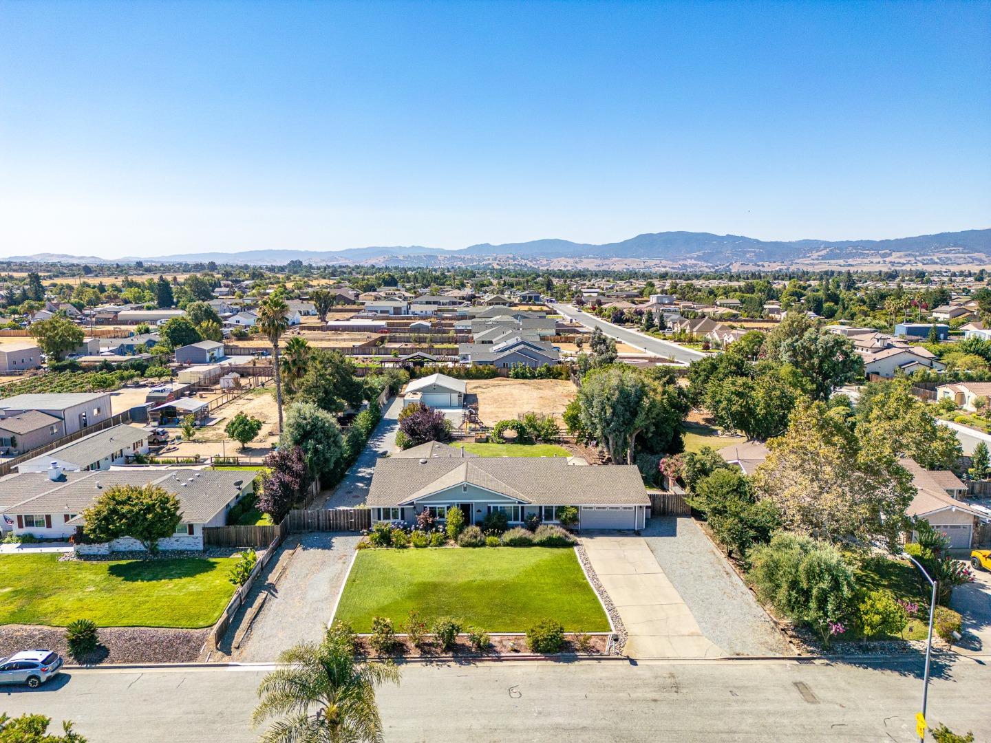 150 Jonquil Lane Hollister, CA 95023 - Photo 58 of 61 an aerial view of a house with a swimming pool yard and outdoor seating