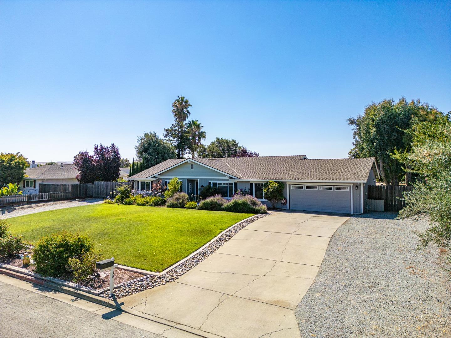 150 Jonquil Lane Hollister, CA 95023 - Photo 61 of 61 a house with swimming pool in front of it