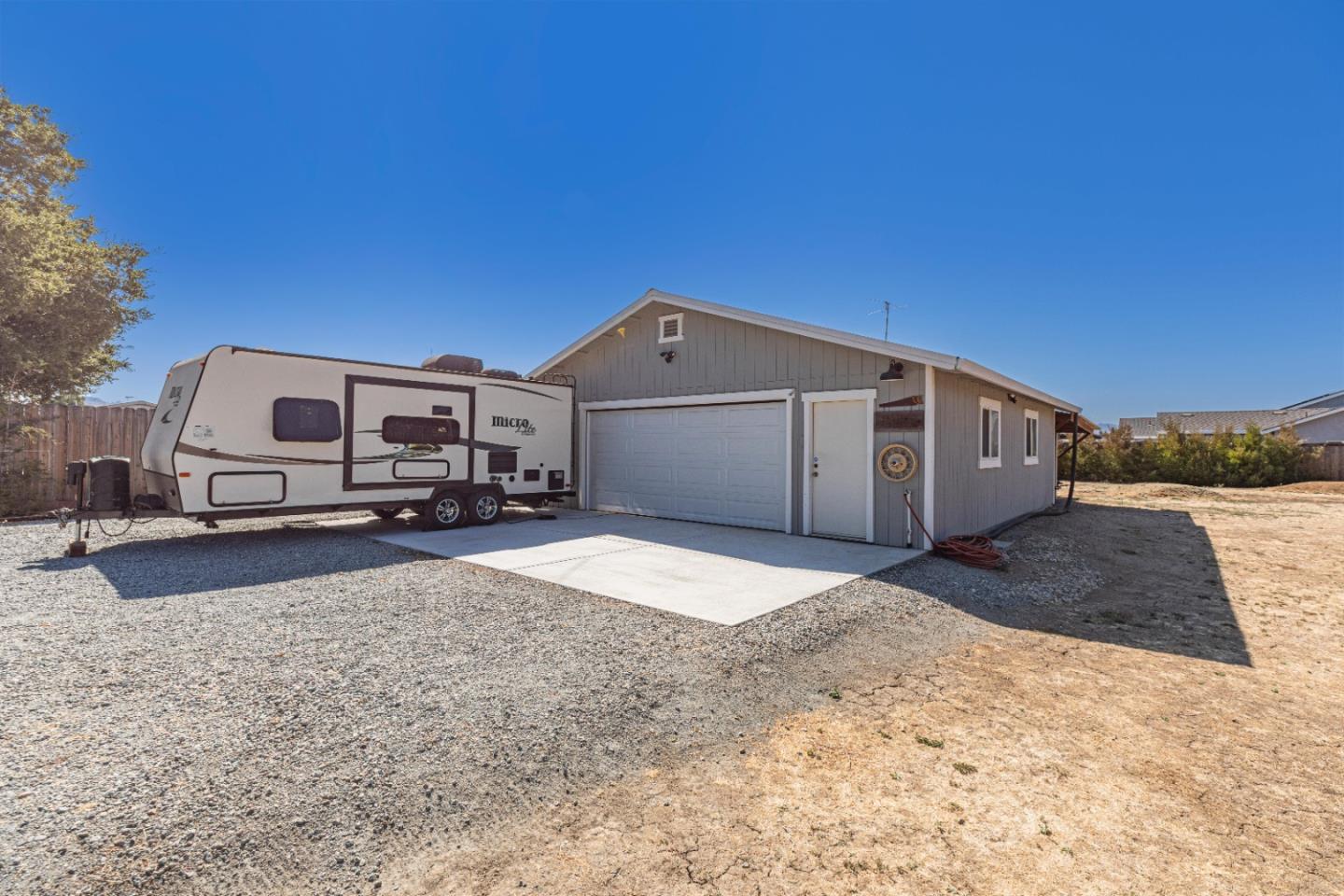 150 Jonquil Lane Hollister, CA 95023 - Photo 7 of 61 a car parked in front of a house
