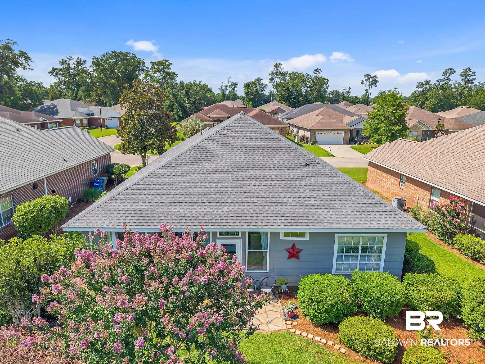 213 Hemingway Loop Foley, AL 36535 - Photo 10 of 69 View of front of home with roof with shingles and a residential view