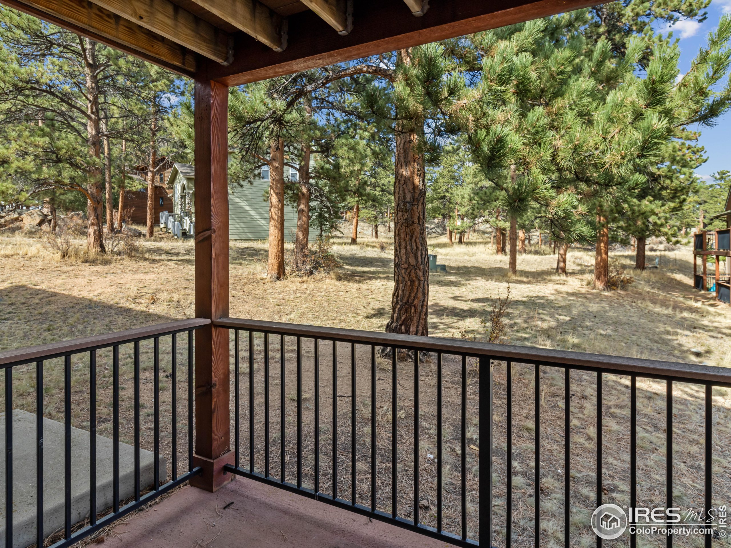 1155 South St Vrain Avenue, Unit 13 Estes Park, CO 80517 - Photo 13 of 18 a street view from a balcony