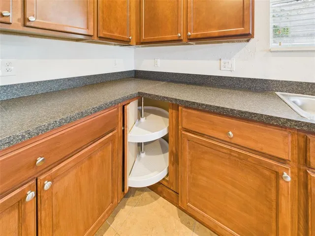 a close view of sink and washing machine