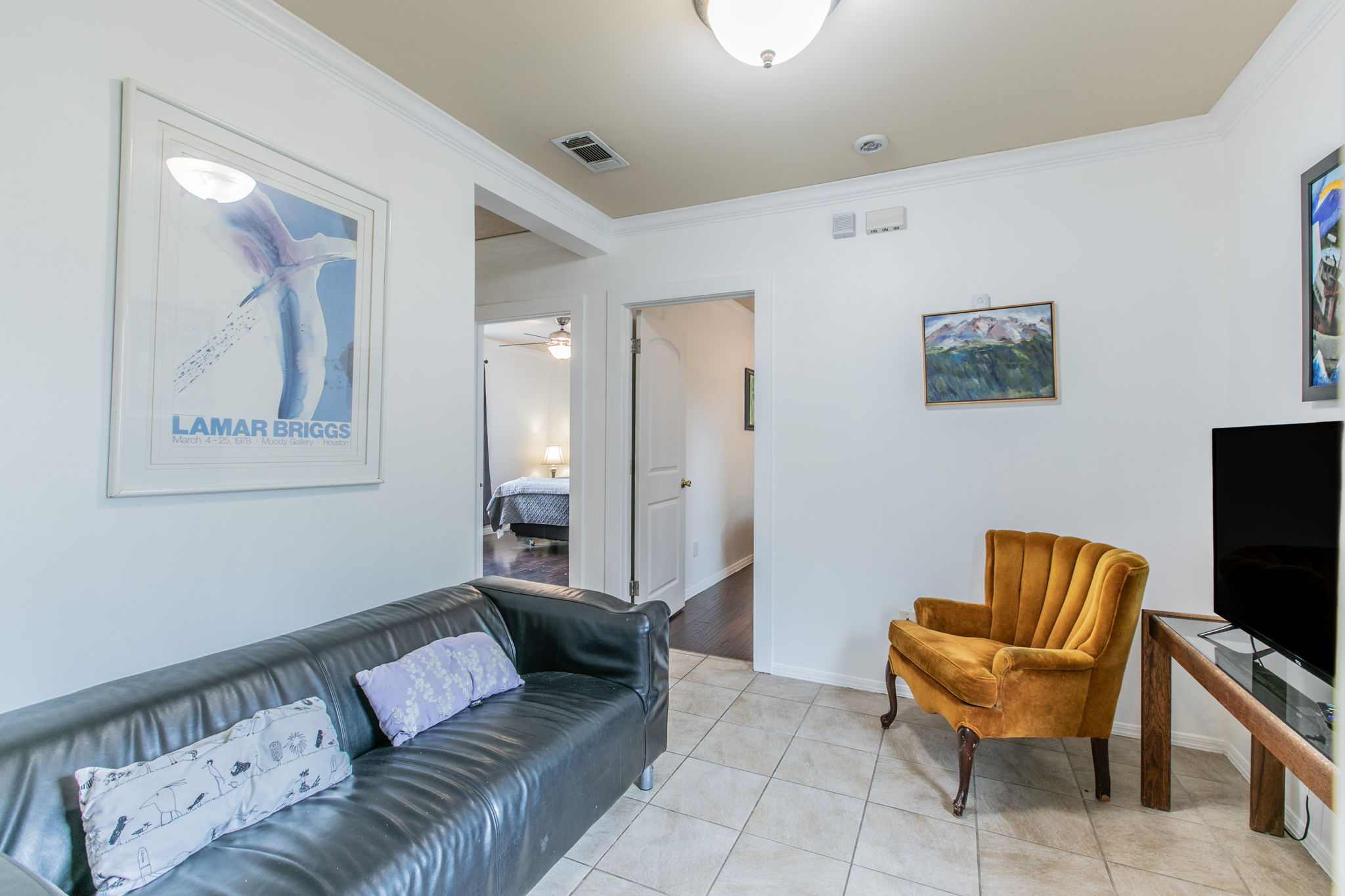 1107 Vargas Road Austin, TX 78741 - Photo 2 of 17 Clean lines define this bright interior space, featuring easy-care tiled flooring.