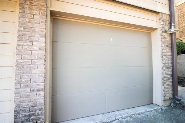 a view of a balcony with stairs and white walls
