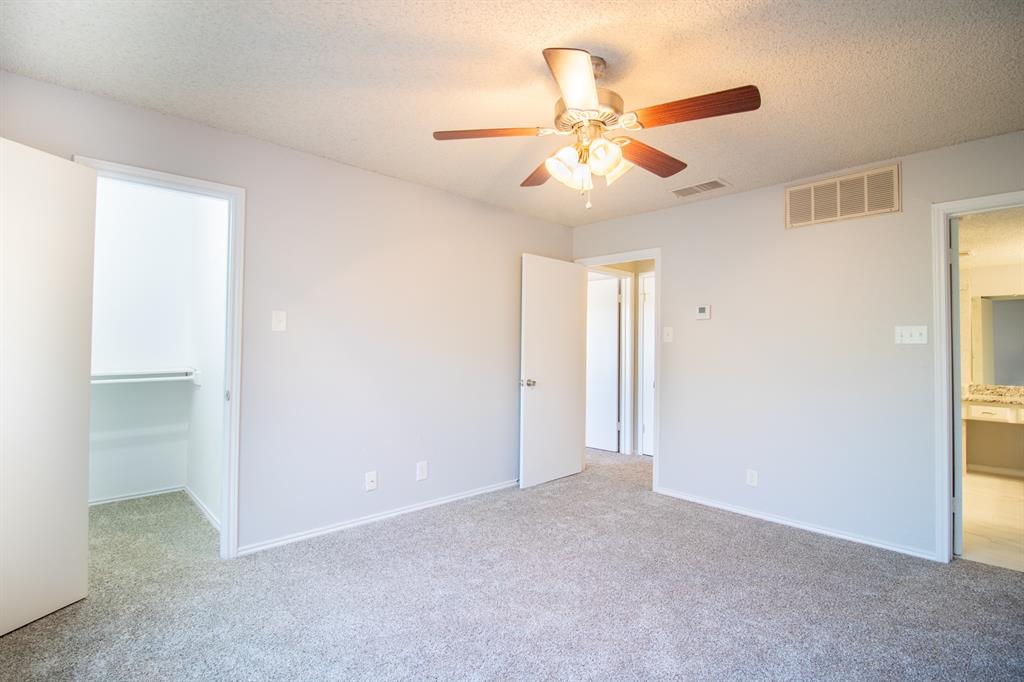 4777 Cedar Springs Road, Unit 4D Dallas, TX 75219 - Photo 10 of 20 a view of an empty room with a window