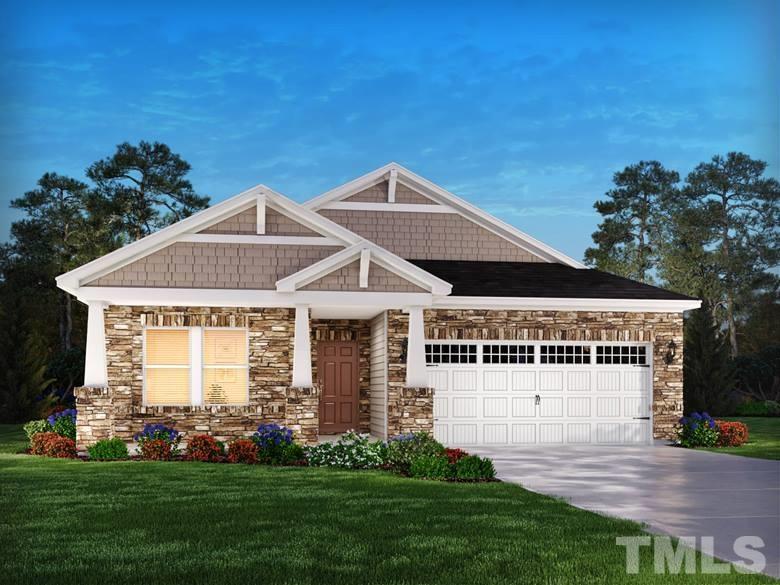 3948 Mountjoy Trail Raleigh, NC 27616 - Photo 1 of 5 a front view of a house with a yard