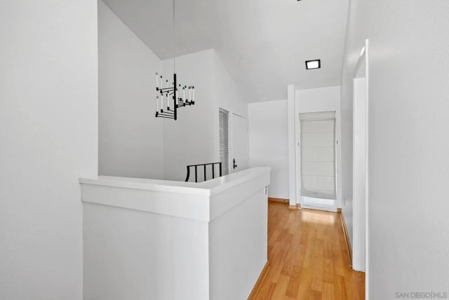 a view of a hallway with workspace