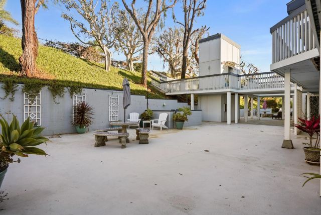 a view of a building with sitting area
