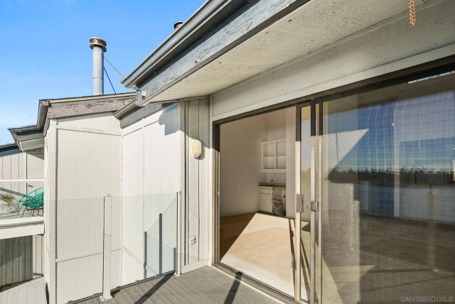 a bathroom with a shower and a sink