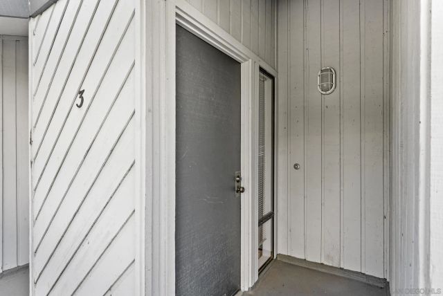 an empty room with a bench