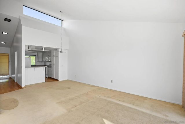 a view of an empty room and window