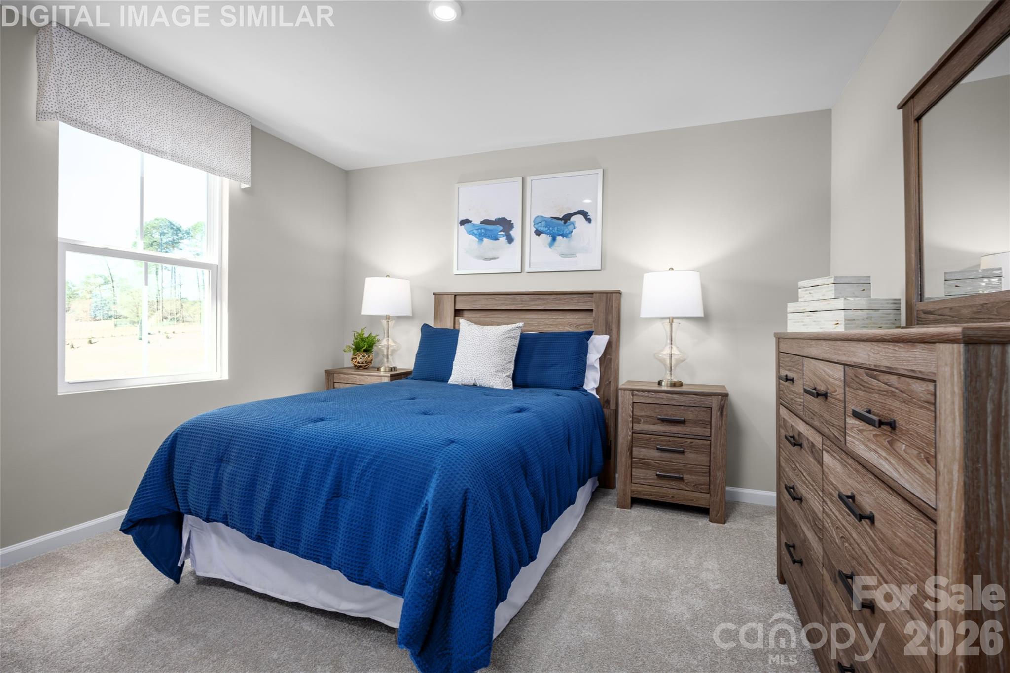 11017 Rococo Lane Charlotte, NC 28214 - Photo 13 of 24 a bedroom with a bed and a window