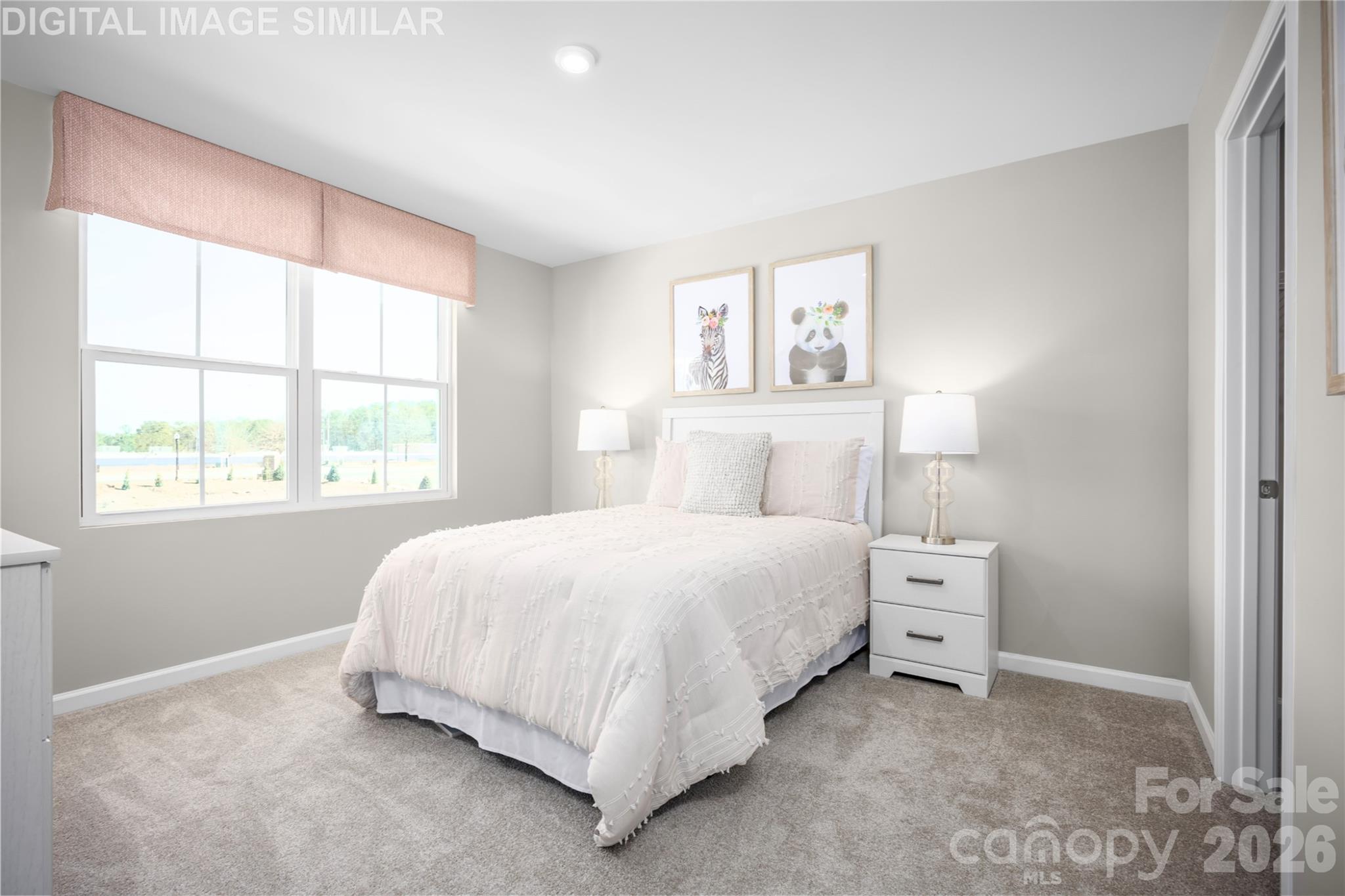 11017 Rococo Lane Charlotte, NC 28214 - Photo 14 of 24 a bedroom with a bed and a window