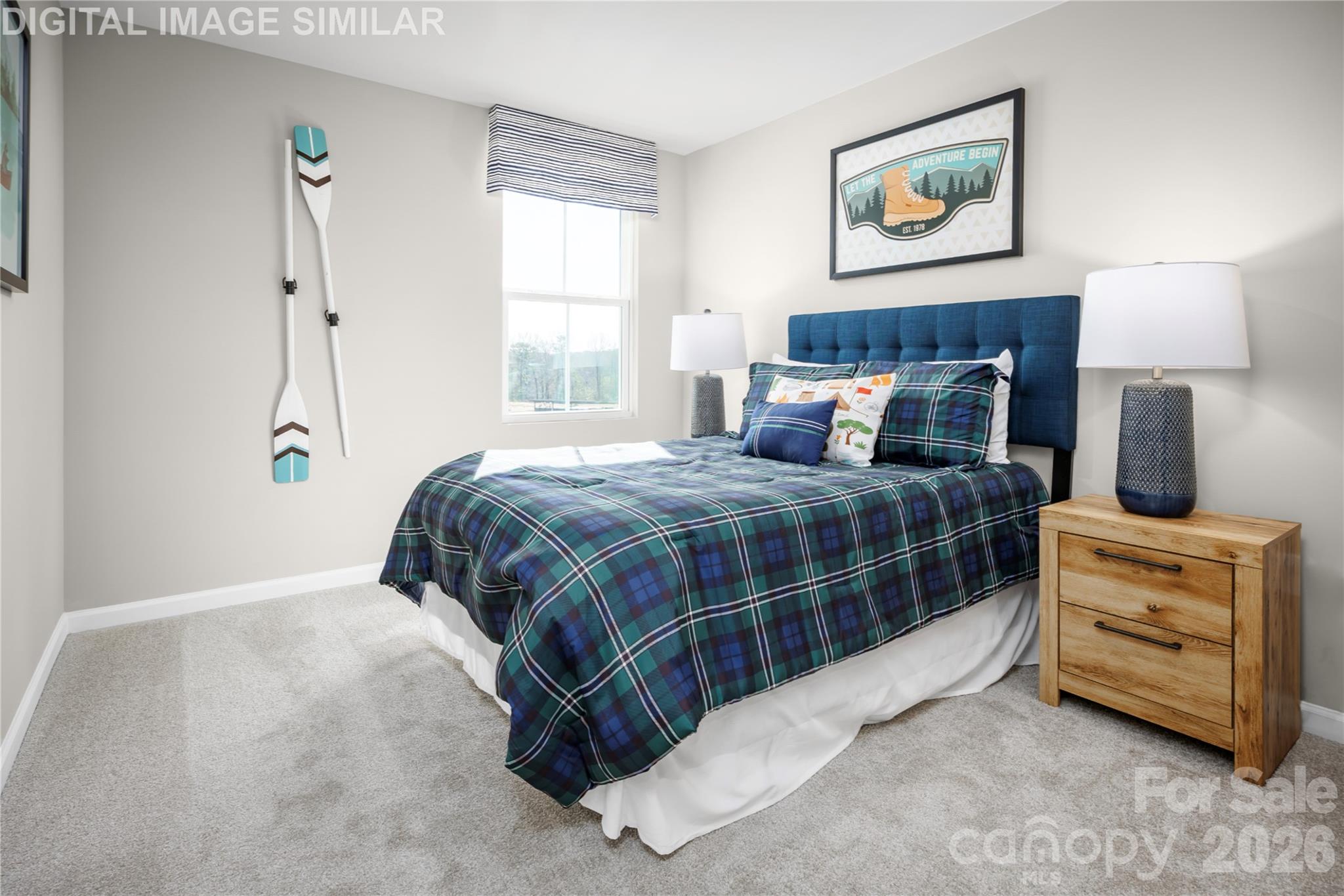 11017 Rococo Lane Charlotte, NC 28214 - Photo 15 of 24 a bedroom with a bed and a window