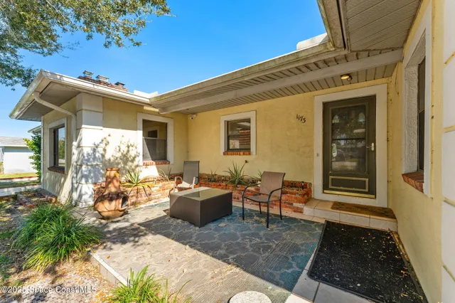 a large kitchen with a lot of counter space and a sink