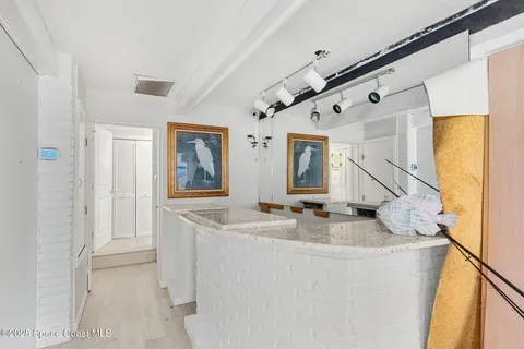 a bedroom with a bed and a table in it