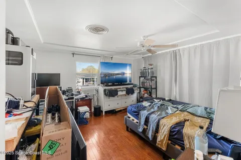 a view of a wooden deck with chairs