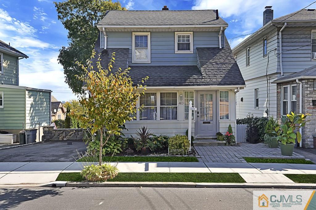 40 Prospect Terrace East Rutherford, NJ 07073 - Photo 2 of 16 a front view of a house with garden