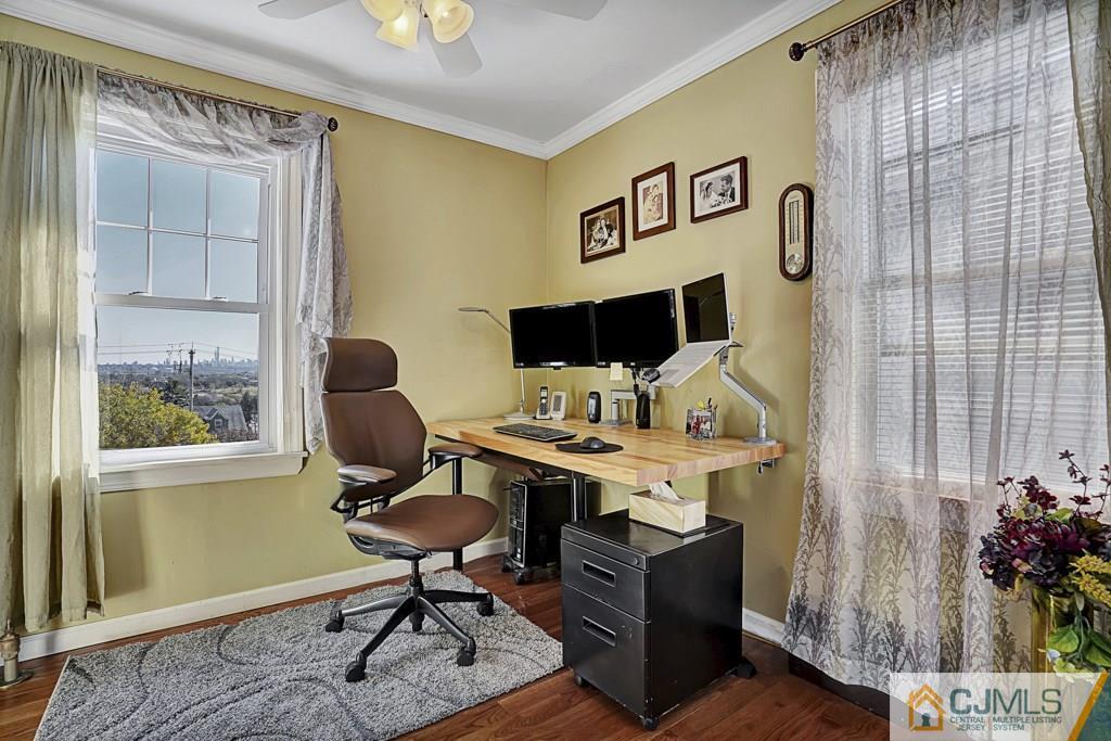 40 Prospect Terrace East Rutherford, NJ 07073 - Photo 11 of 16 a view of a workspace with furniture and a window