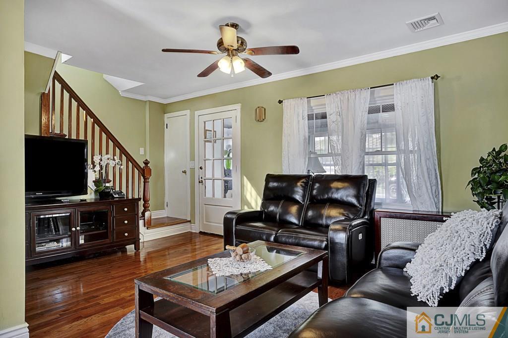 40 Prospect Terrace East Rutherford, NJ 07073 - Photo 5 of 16 a living room with furniture and a flat screen tv