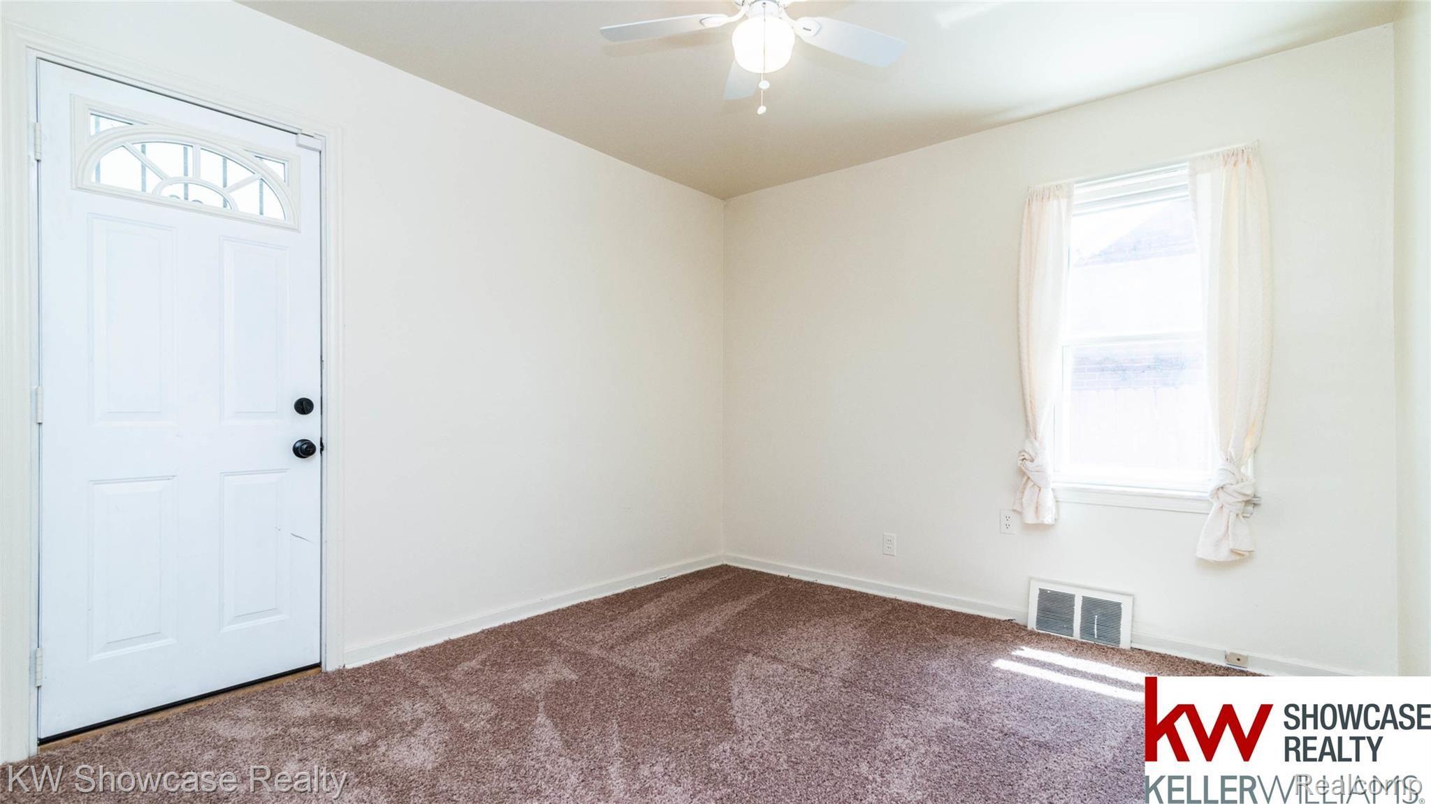 18468 Rutherford Street Detroit, MI 48235 - Photo 7 of 15 bedroom 1 leading to 3 season room