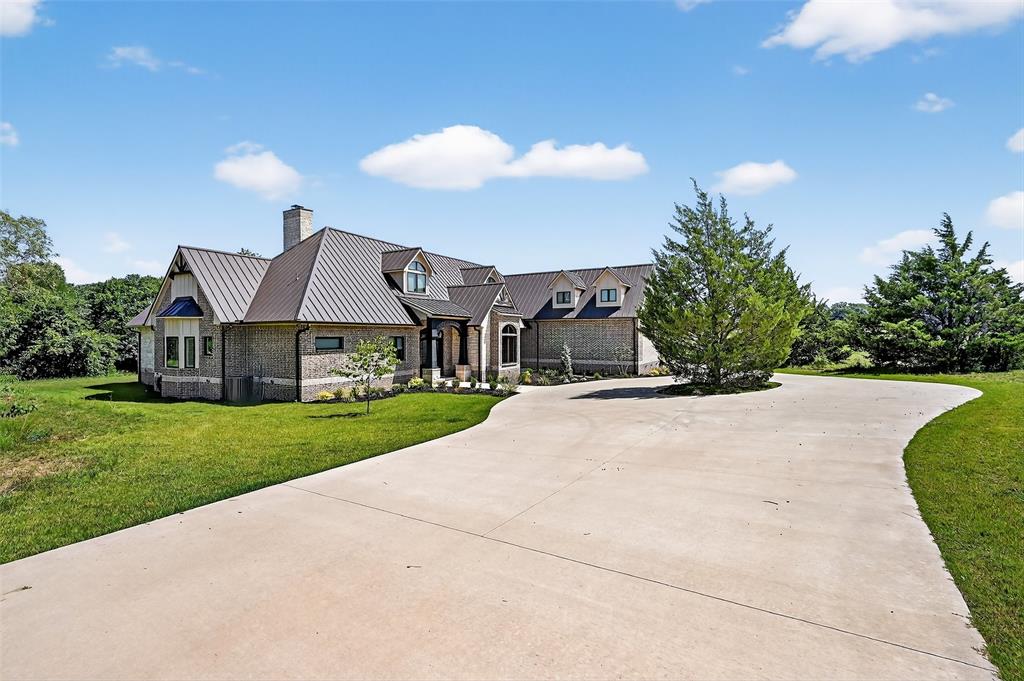 1770 Durning Road Van Alstyne, TX 75495 - Photo 15 of 40 a view of a house with a yard and pathway