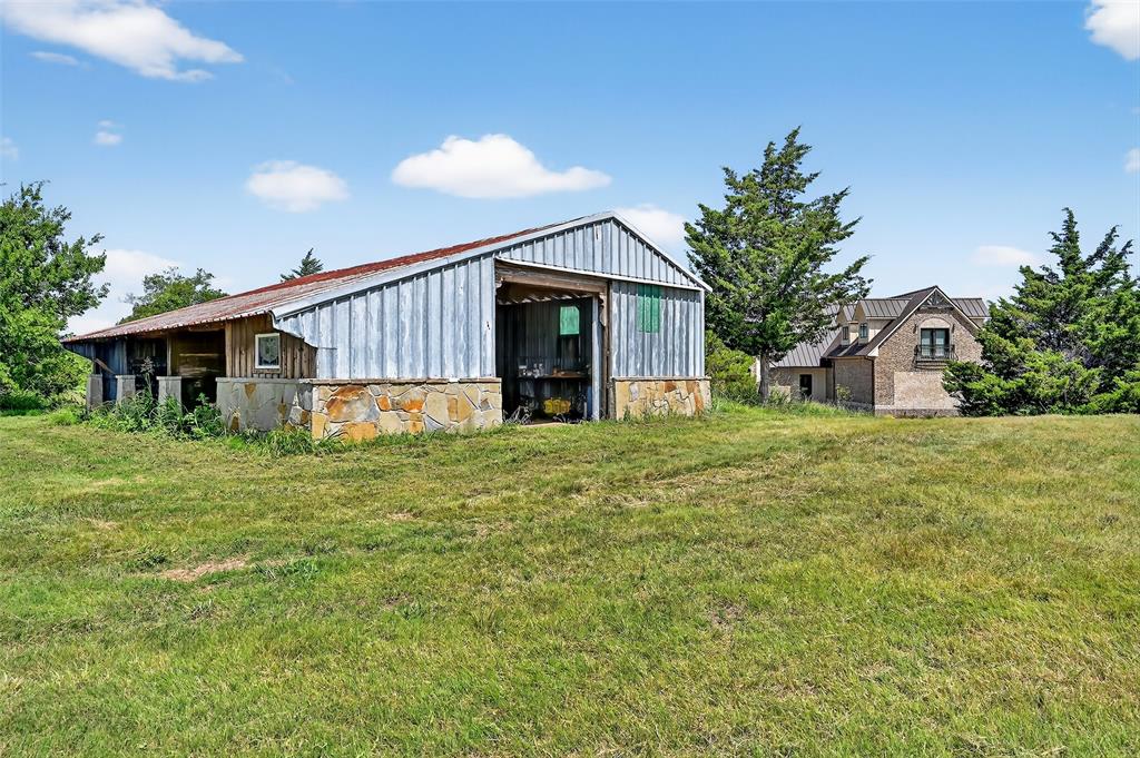 1770 Durning Road Van Alstyne, TX 75495 - Photo 17 of 40 a front view of house with a garden
