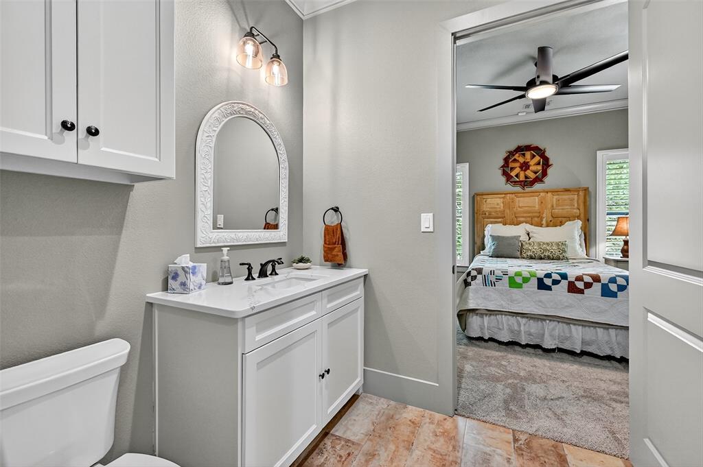 1770 Durning Road Van Alstyne, TX 75495 - Photo 27 of 40 a en suite bathroom with a sink double vanity and a tub