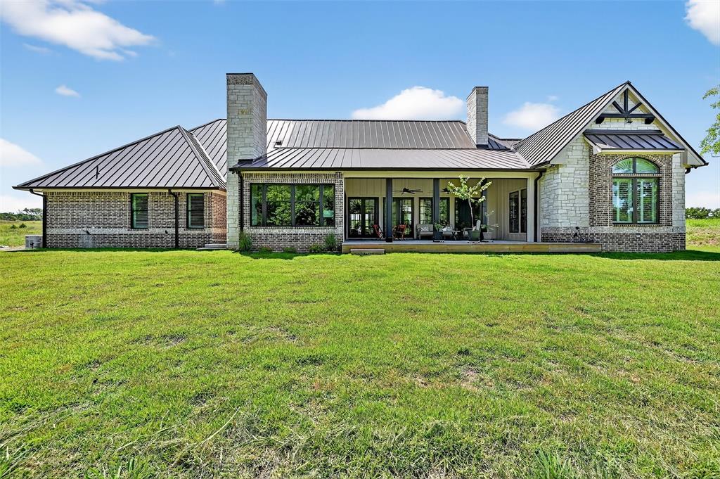 1770 Durning Road Van Alstyne, TX 75495 - Photo 9 of 40 front view of a house with a yard