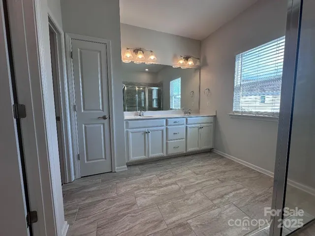 a view of a kitchen from the hallway