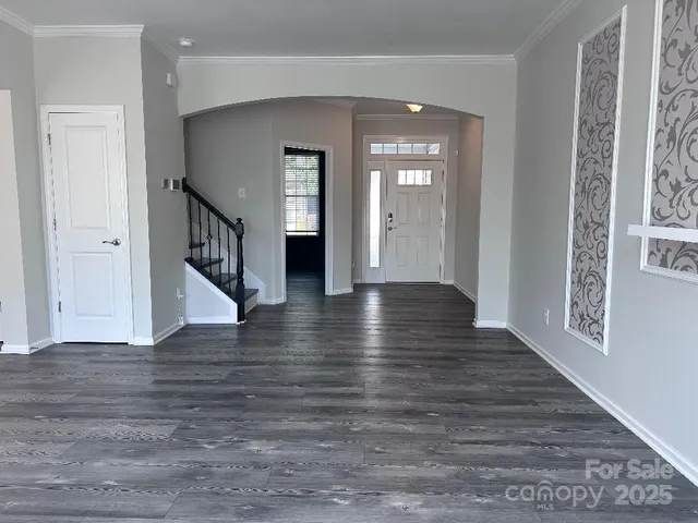 a view interior of a house with wooden floor windows and stairs