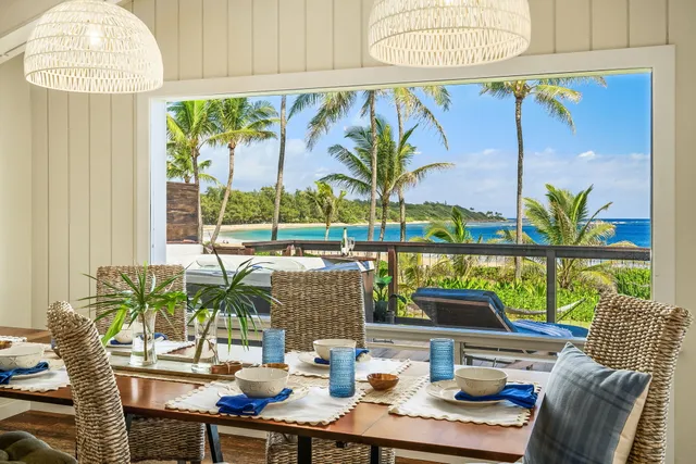 a view of a dining room with furniture window and outside view