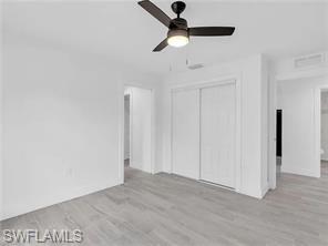 4330 Gulfstream Drive Naples, FL 34112 - Photo 9 of 15 a view of empty room with ceiling fan